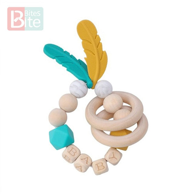 Bite Bites 1PC Food Grade Silicone Feather Teether Chewing Custom Bracelets Baby Care Products Wooden Teething Ring Baby Teether