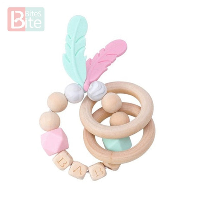 Bite Bites 1PC Food Grade Silicone Feather Teether Chewing Custom Bracelets Baby Care Products Wooden Teething Ring Baby Teether