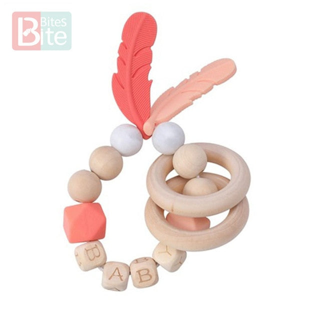 Bite Bites 1PC Food Grade Silicone Feather Teether Chewing Custom Bracelets Baby Care Products Wooden Teething Ring Baby Teether