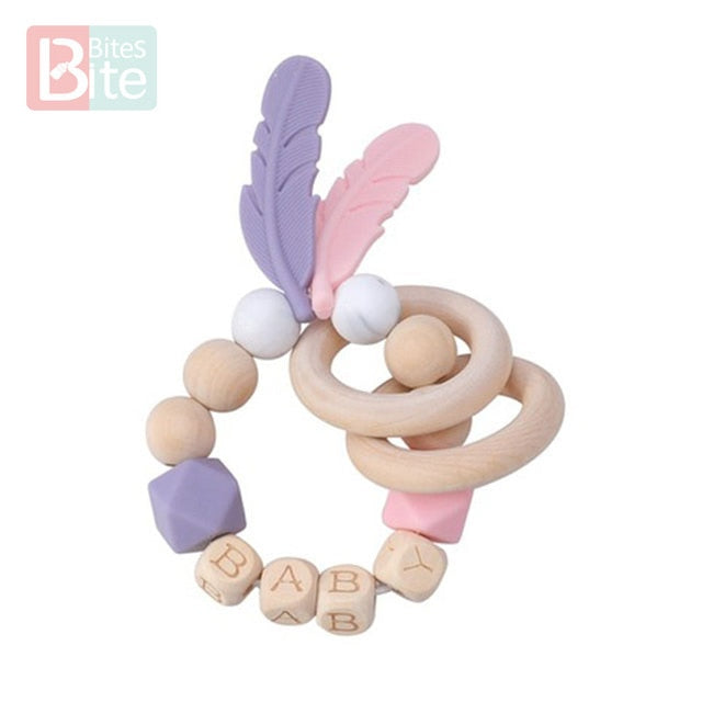 Bite Bites 1PC Food Grade Silicone Feather Teether Chewing Custom Bracelets Baby Care Products Wooden Teething Ring Baby Teether