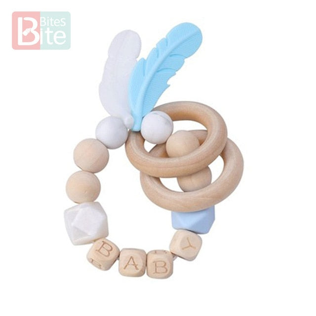 Bite Bites 1PC Food Grade Silicone Feather Teether Chewing Custom Bracelets Baby Care Products Wooden Teething Ring Baby Teether