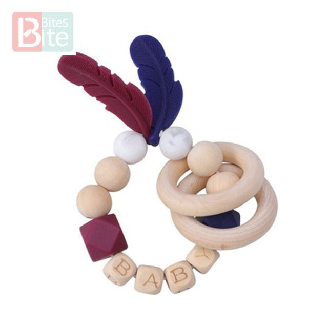 Bite Bites 1PC Food Grade Silicone Feather Teether Chewing Custom Bracelets Baby Care Products Wooden Teething Ring Baby Teether